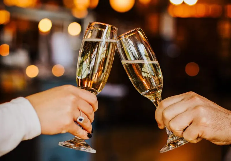 People enjoying bottles of Prosecco at The Barley Mow Hersham on Fizz Friday.
